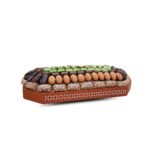 Leather brown tray with assorted chocolate